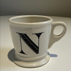 Anthropologie White Ceramic Mug with Black Lettering